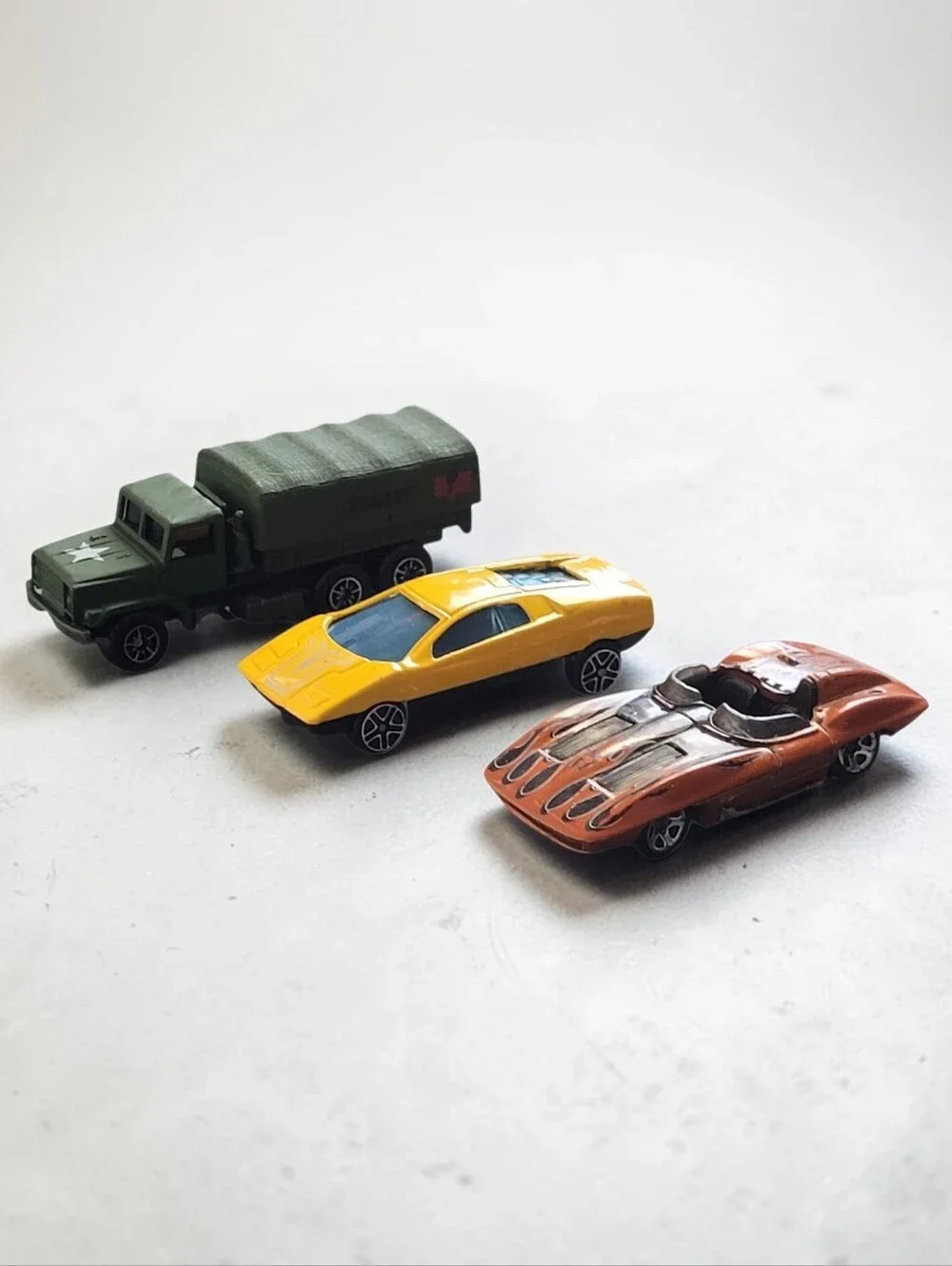 (Lot Of 3) Assorted Corvette Stingray /Datsun 126X/ Military Truck Die-Cast 1:64